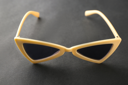 Stylish sunglasses on black backgroundの写真素材