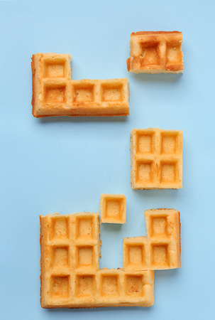 Creative composition with waffles on light backgroundの写真素材