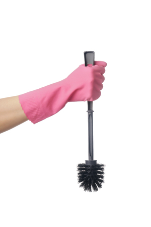 Woman holding toilet brush on white background