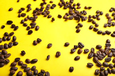 Coffee beans on color backgroundの写真素材