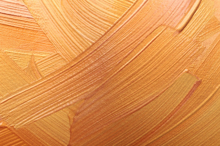 Strokes of different gold paints, closeupの写真素材