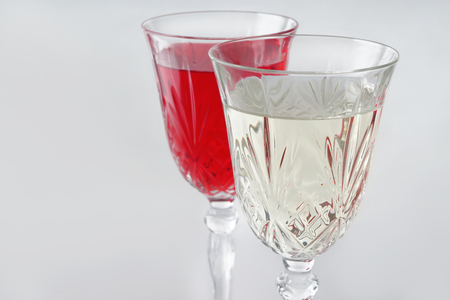 Glasses of different wine on white backgroundの写真素材