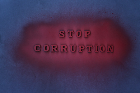 Text STOP CORRUPTION on dark backgroundの写真素材