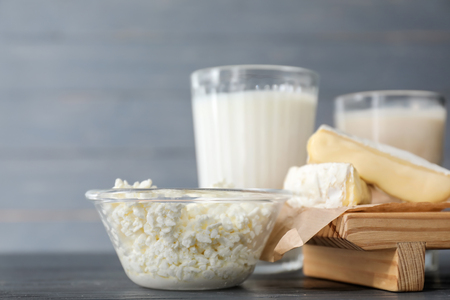 Different milk products on wooden tableの写真素材