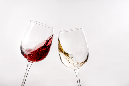 Glasses of different wine on white backgroundの写真素材