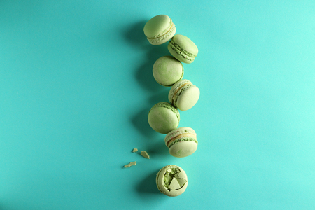 Fresh tasty macaroons on color backgroundの写真素材