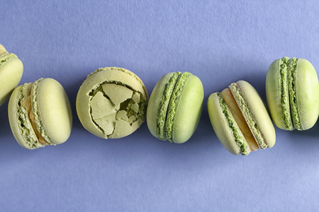 Fresh tasty macaroons on color backgroundの写真素材