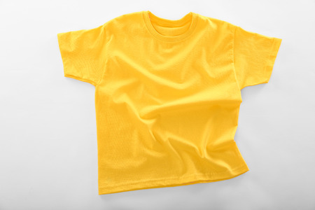 Blank yellow t-shirt on white backgroundの写真素材