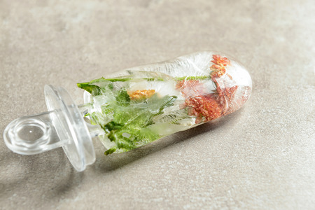 Beautiful floral ice cream on grey backgroundの写真素材