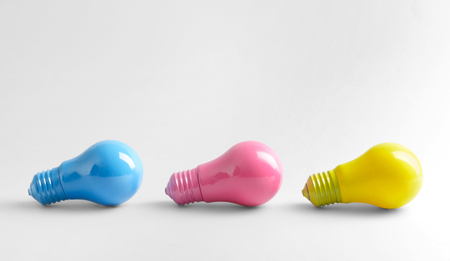 Painted light bulbs on white backgroundの写真素材
