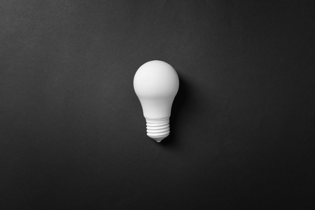 Light bulb on dark backgroundの写真素材