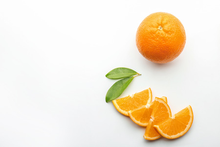 Tasty ripe oranges on white background