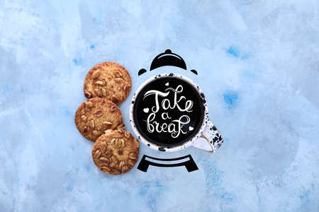 Creative composition with cup of coffee and cookies on color backgroundの写真素材