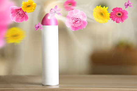 Floral air freshener on table in room