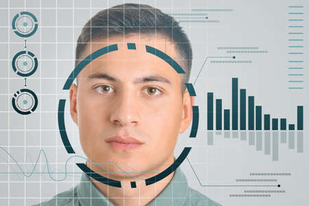 Young businessman using facial recognition system for data protectionの写真素材
