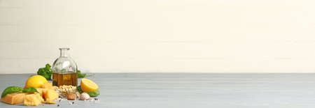 Ingredients for pesto sauce on gray table with space for textの写真素材