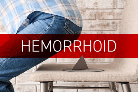 Woman sitting down on chair with thumbtack. Hemorrhoids concept
