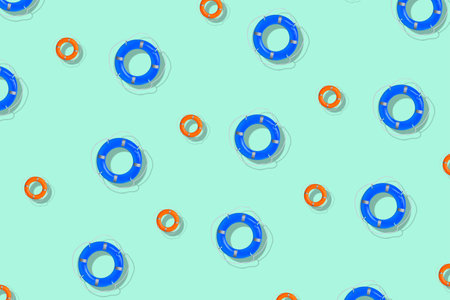 Many lifebuoy rings on color backgroundの写真素材