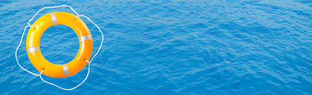 Lifebuoy ring on water surface with space for textの写真素材