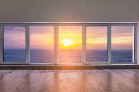 View on beautiful sea through big metal-plastic window