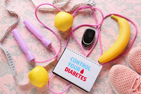 Fruits, sports equipment, notebook with text CONTROL YOUR DIABETES, measuring tape and glucometer on color backgroundの写真素材