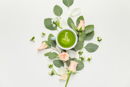 Beautiful composition with cup of matcha tea on white backgroundの写真素材