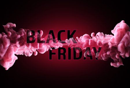Text BLACK FRIDAY on dark color background with paint splashの写真素材