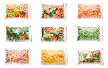 Collage of different frozen vegetables on white backgroundの写真素材