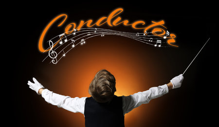 Little conductor and note signs on dark color backgroundの写真素材