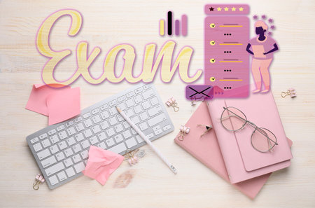 Computer keyboard with school supplies and word "Exam" on light wooden backgroundの写真素材