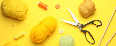 Sewing supplies on color background