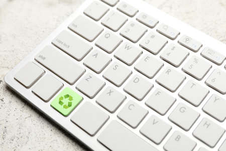 Computer keyboard on light background. Ecology conceptの写真素材