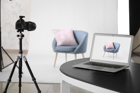 Interior of modern studio during photographing of furniture