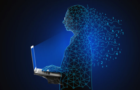 Portrait of young woman with laptop on dark background. Concept of computer scienceの写真素材
