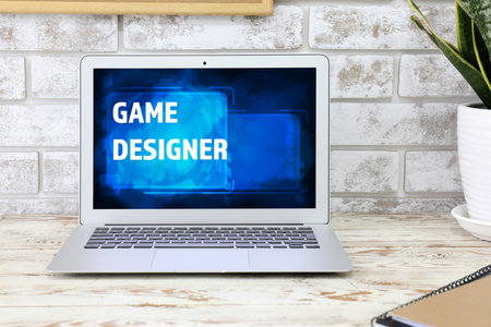 Modern workplace of video games designer with computer in studioの写真素材