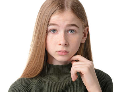 Sad teenage girl on white backgroundの写真素材