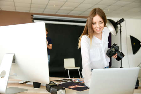 Professional photographer in modern studio