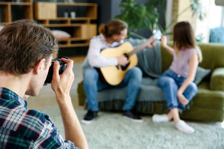 Professional photographer working with models in studioの写真素材