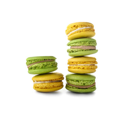 Tasty macarons on white background