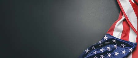 USA flag on dark background with space for text