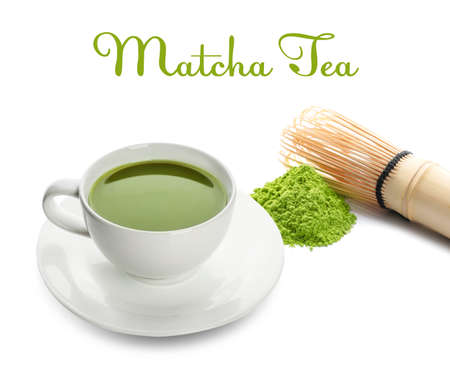 Cup of tasty matcha tea and chasen on white background
