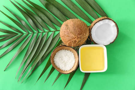 Composition with coconut oil on color background