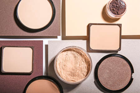 Different facial powder on color backgroundの写真素材
