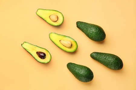 Fresh avocado on color background