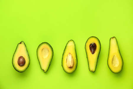 Fresh avocado on color background