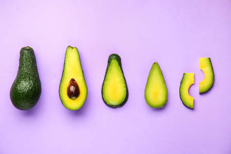 Fresh avocado on color backgroundの写真素材