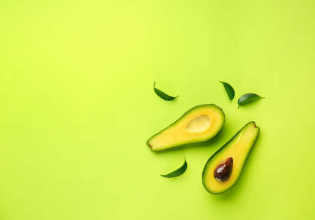 Fresh avocado on color background