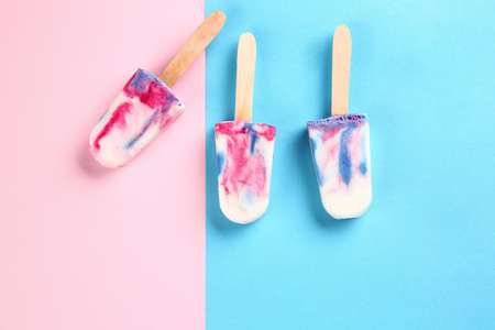 Tasty ice cream on color backgroundの写真素材
