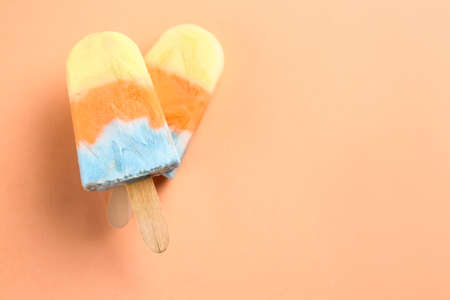 Tasty ice cream on color backgroundの写真素材