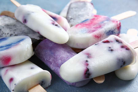 Heap of tasty ice cream on table